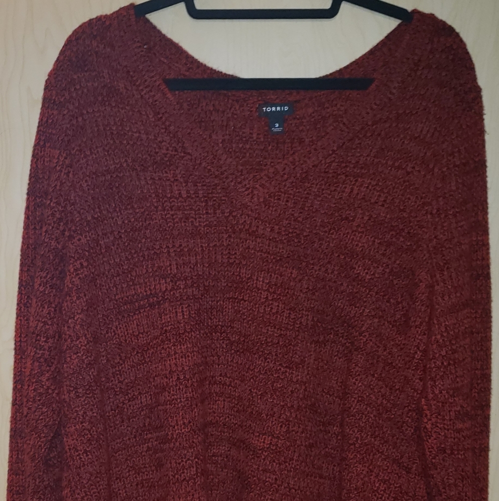 Deep red sweater